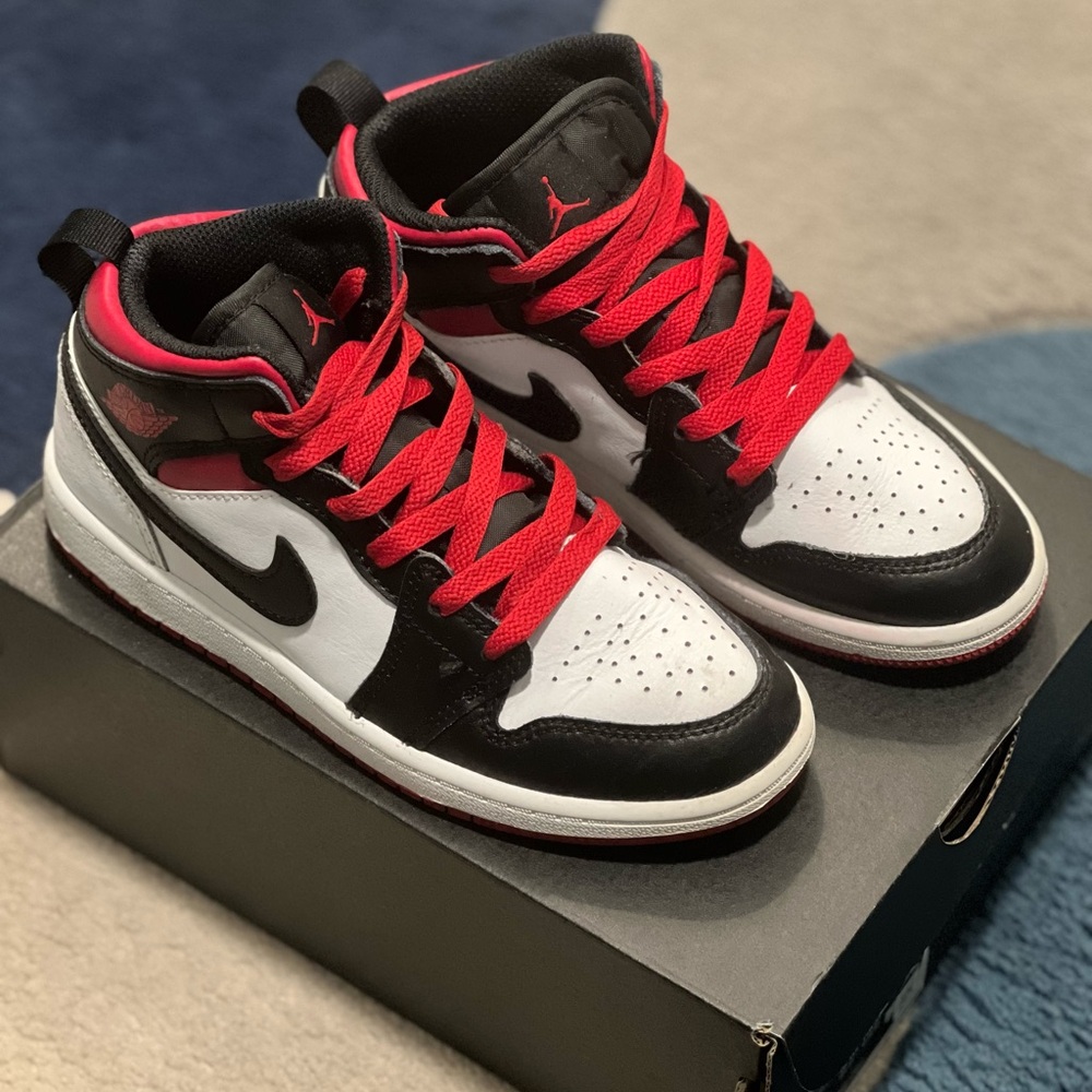 SOLD…LIKE NEW*** Jordan Retro 1, in black, white, and red. Size 1